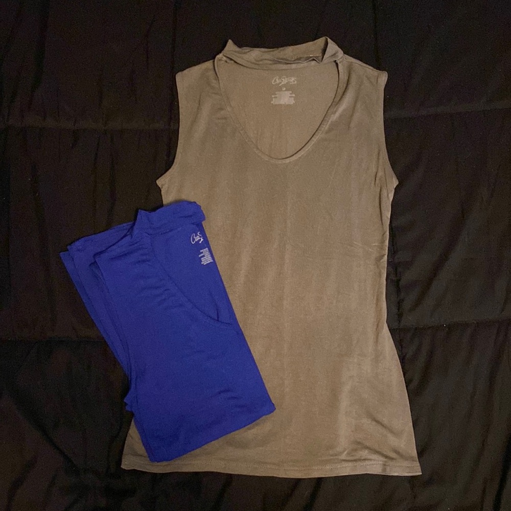 Two tank tops fitted one blue and one army green, around the neck piece, low cut